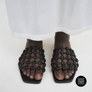 Toteme Braided-leather bandeau slides black